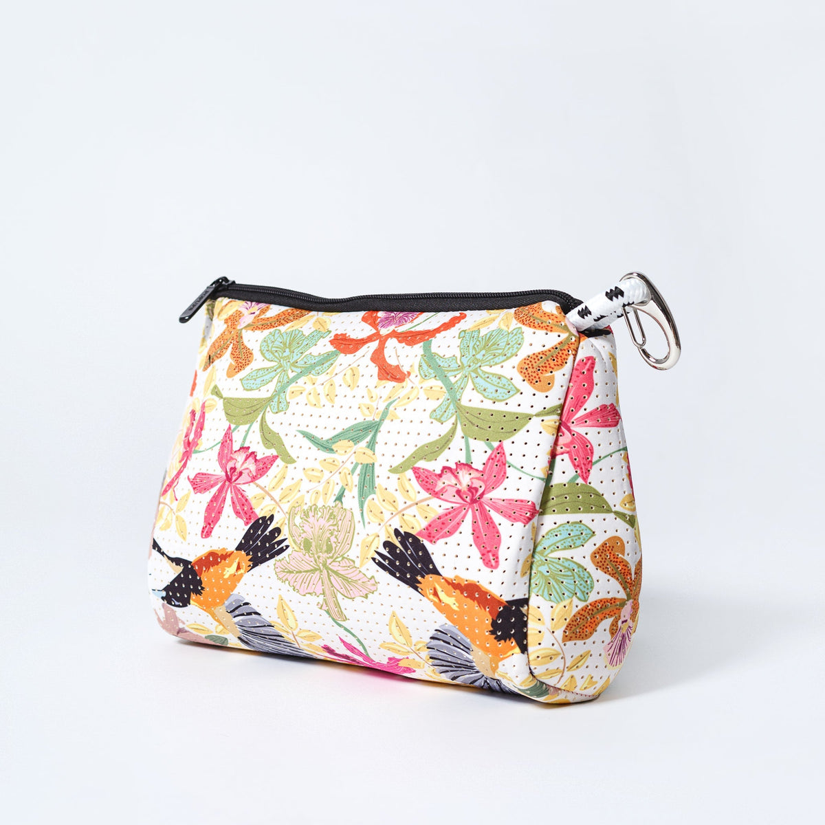 Printed zip pouch with colorful leaf and flower pattern, black zipper, metal key ring