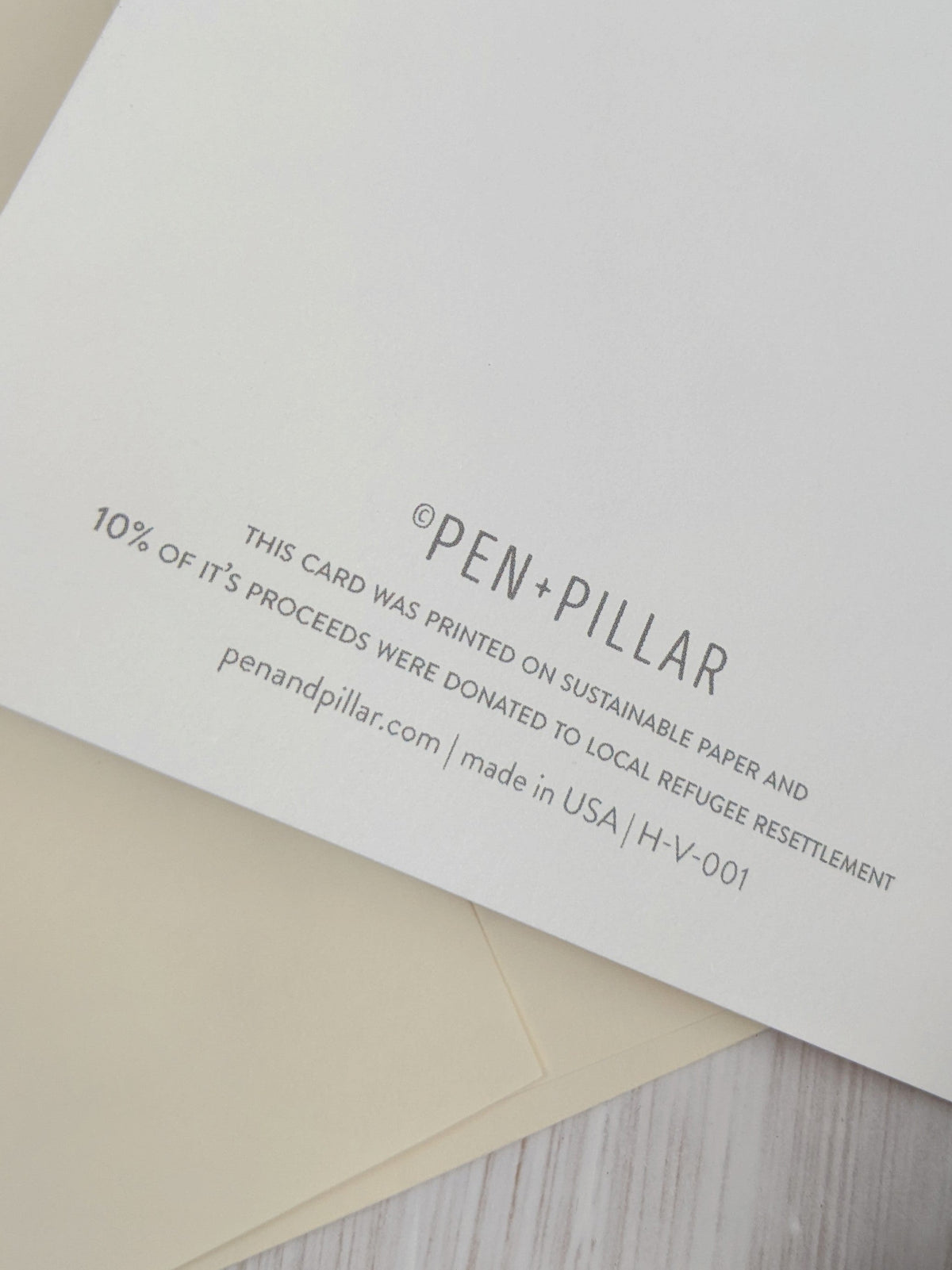 Pen+Pillar paper greeting card back with printed text and 10% proceeds note
