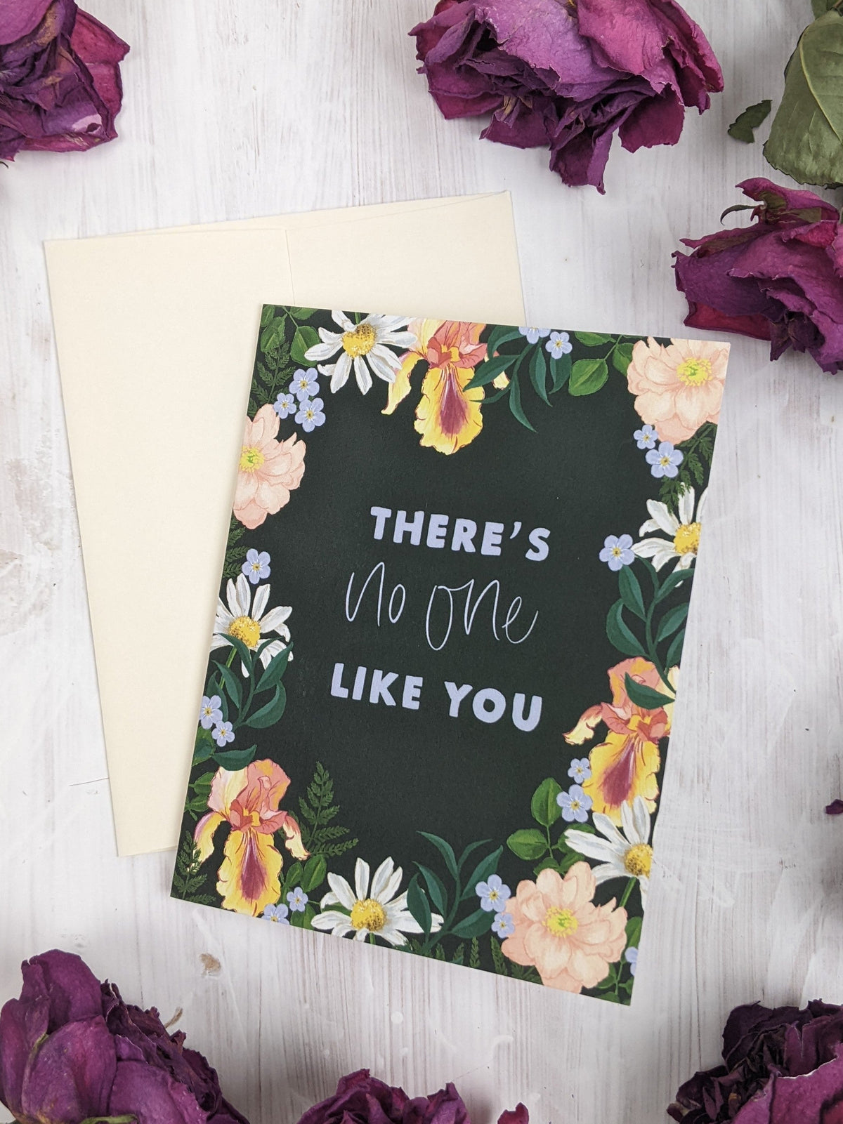 Floral greeting card with black cover, 'There's No One Like You' and flower frame