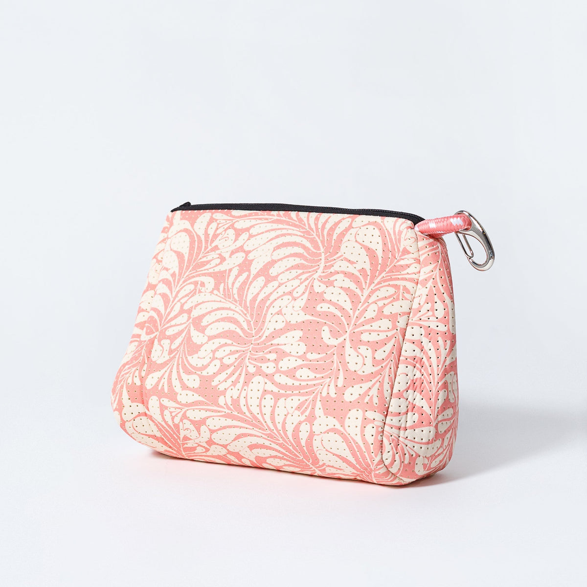 Pink patterned zip pouch with metal D-ring and black zipper pull