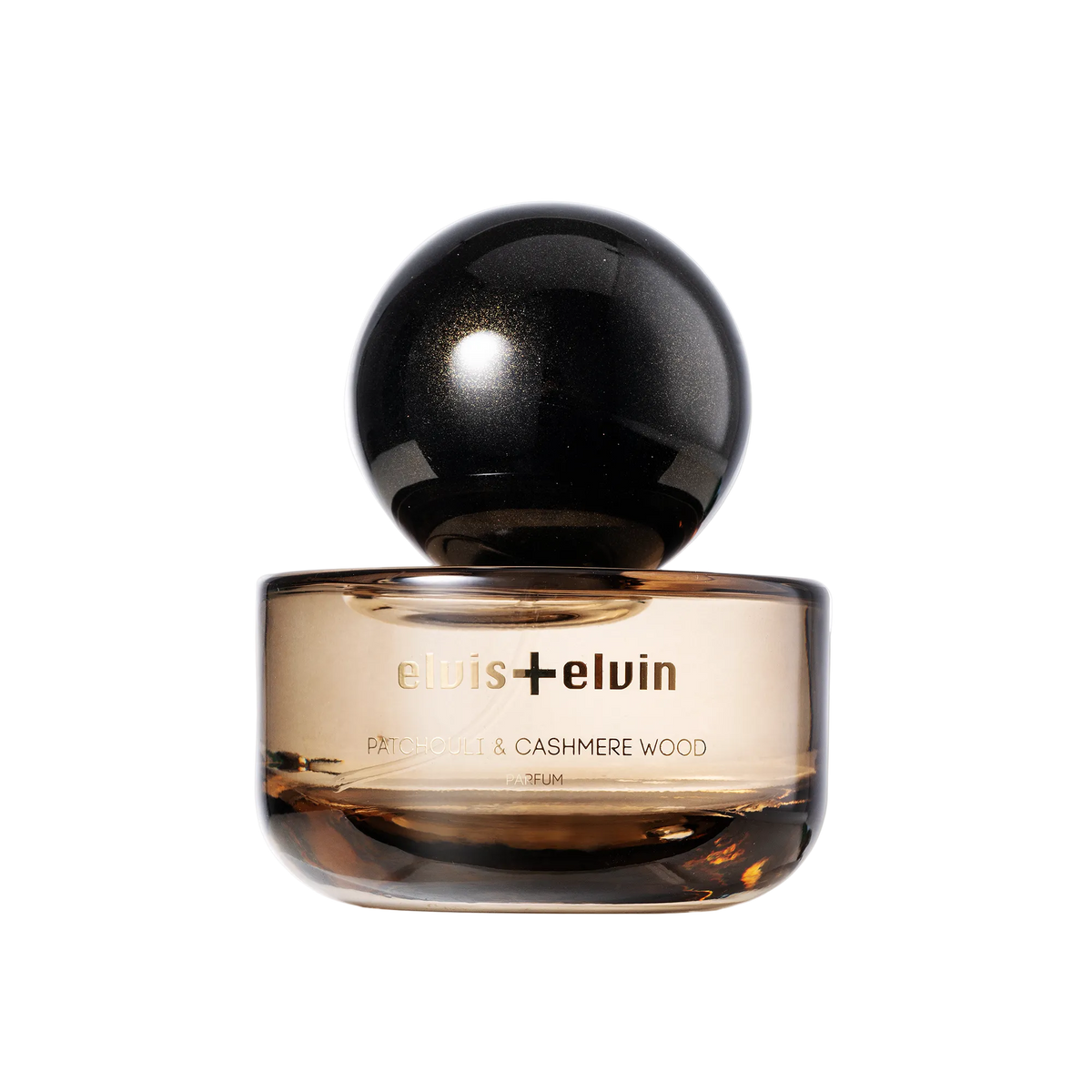 Patchouli and Cashmere Wood perfume bottle with black dome cap and amber glass