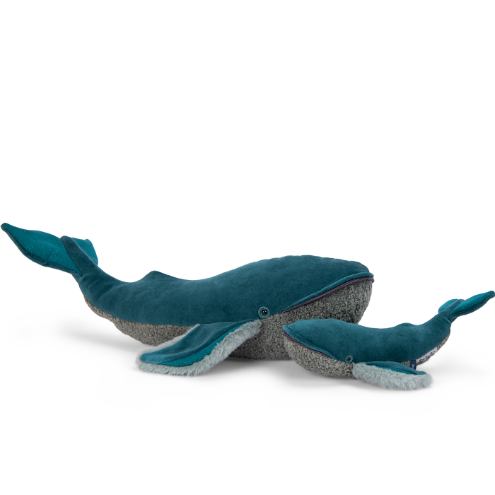 Two plush whales in different sizes, with teal bodies, gray textured undersides, and stitched eyes.