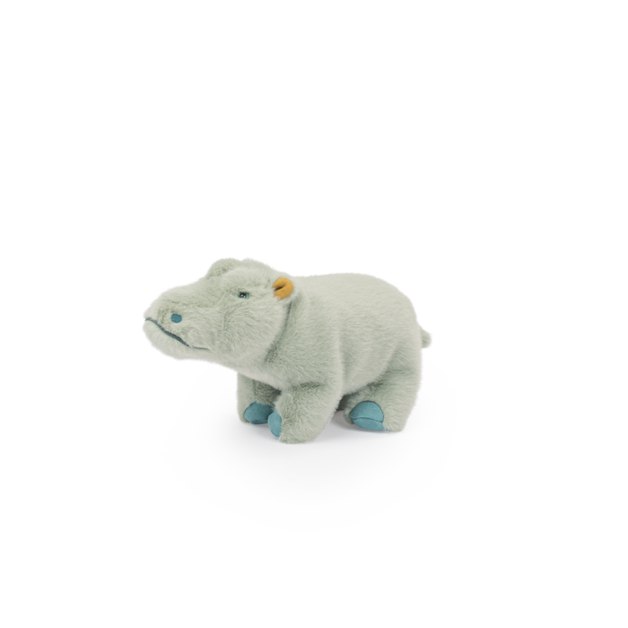 Light gray hippopotamus plush toy resting on a white base, side profile with blue feet.