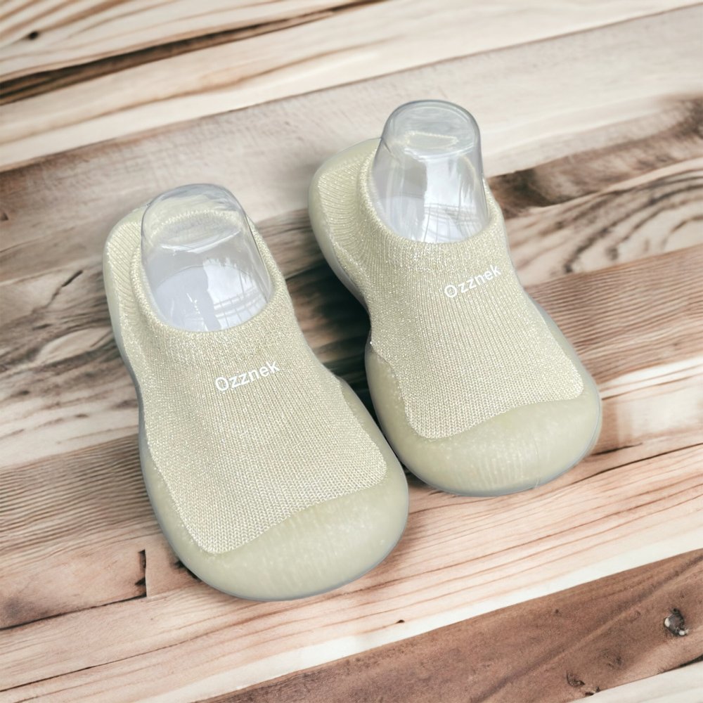 Light pale green knit sock shoes with clear sole and Ozznek logo on the insole