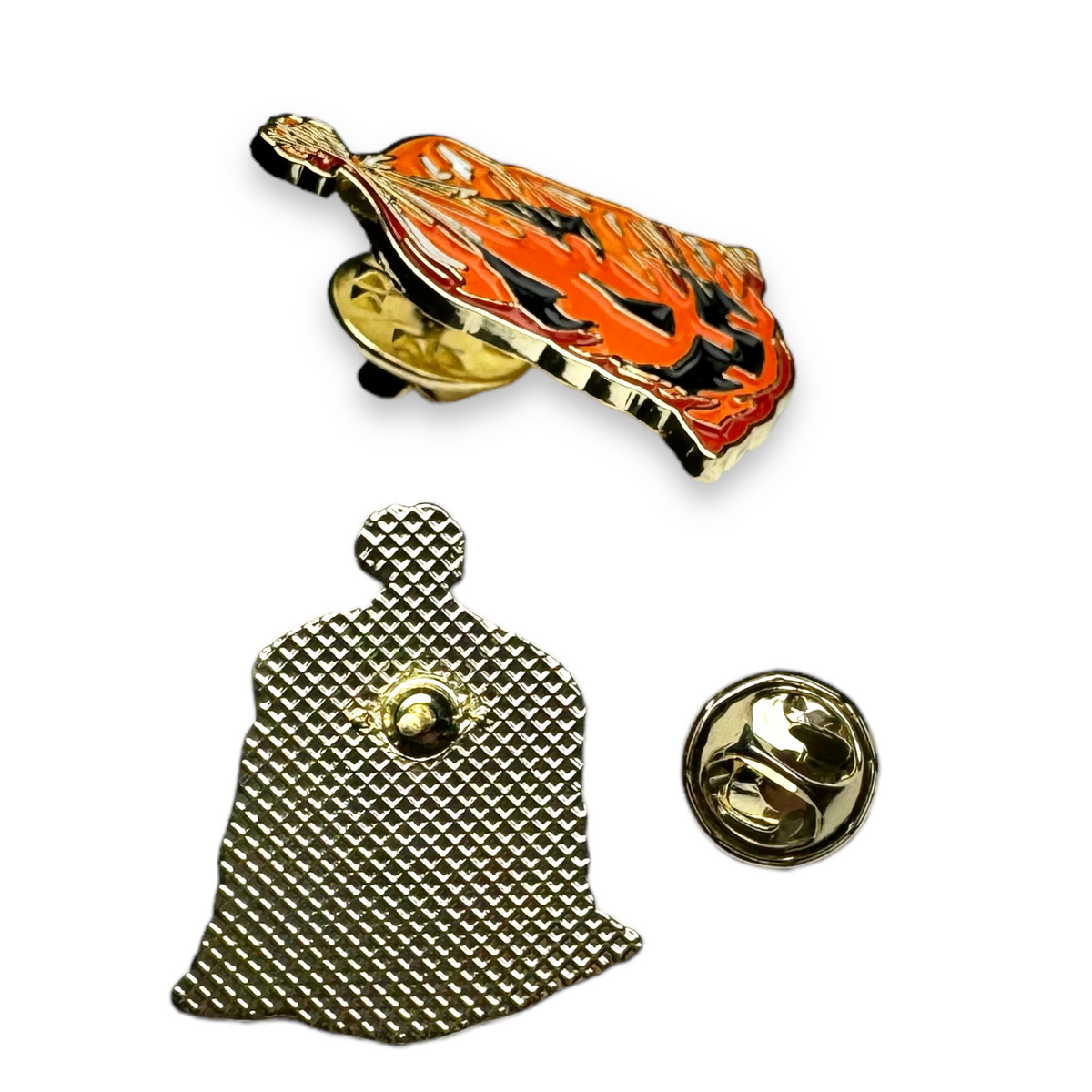 Enamel jack-o'-lantern leaf bag pin with gold backing and pin clasp