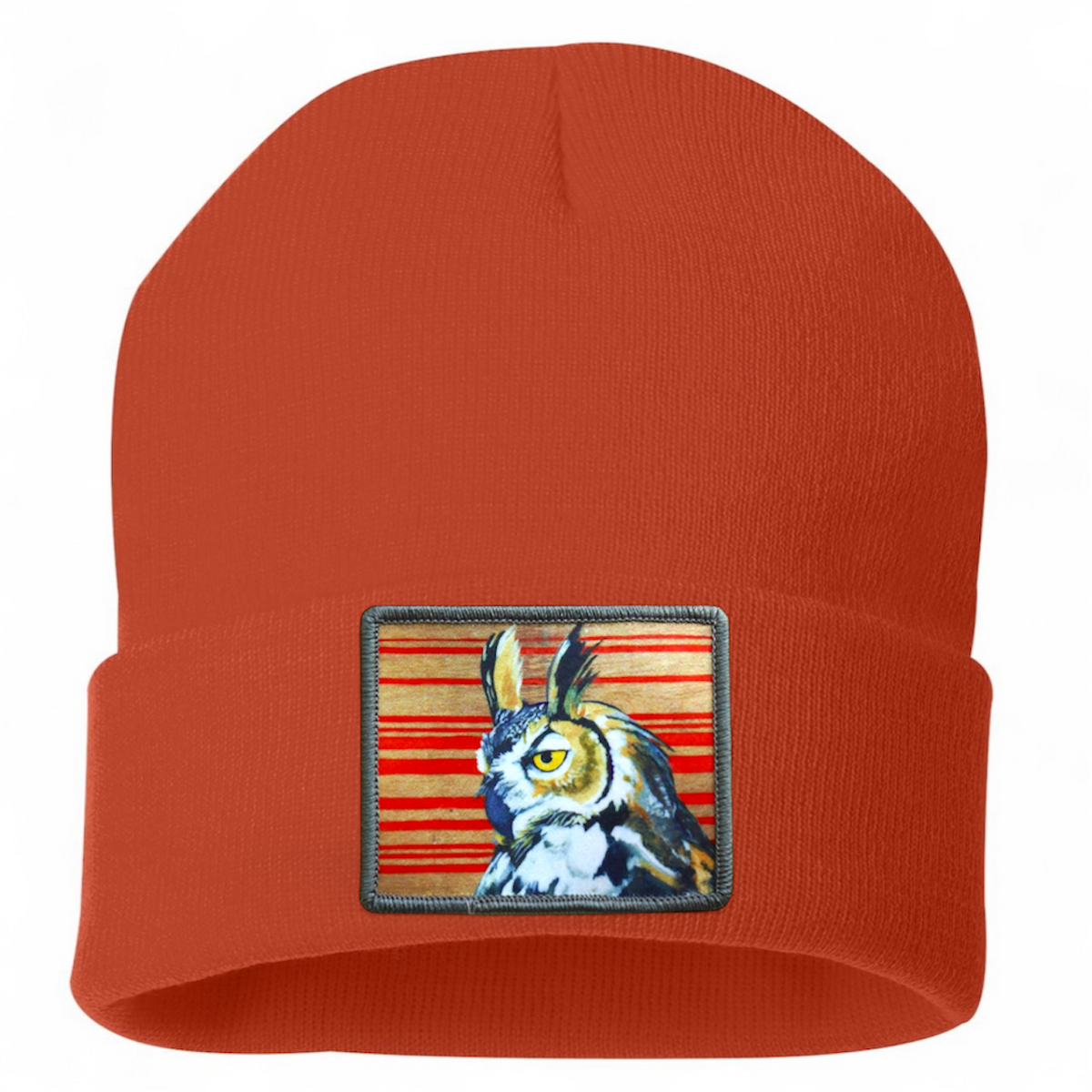 Burnt orange knit beanie with rectangular owl patch
