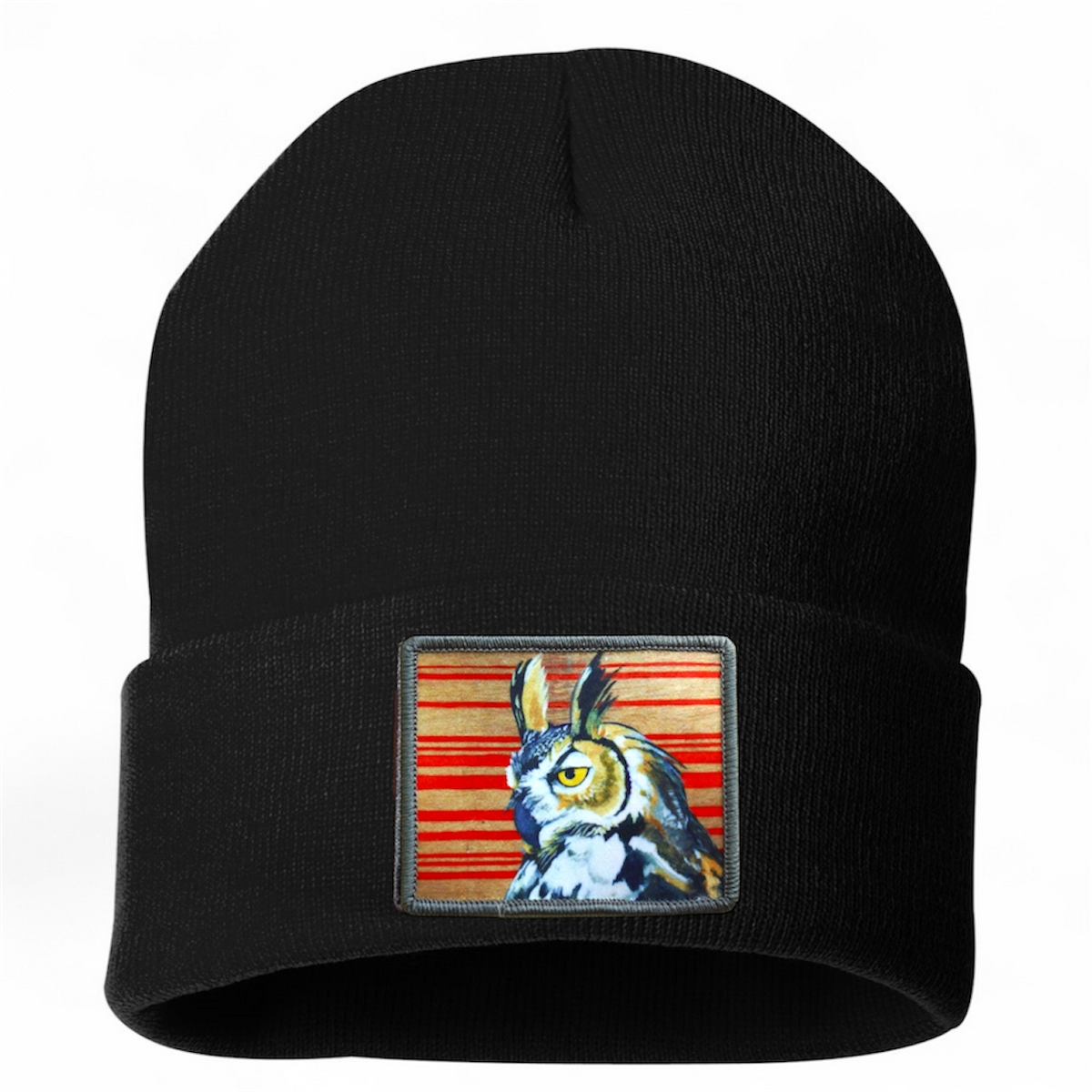 Black knit beanie with rectangular owl patch