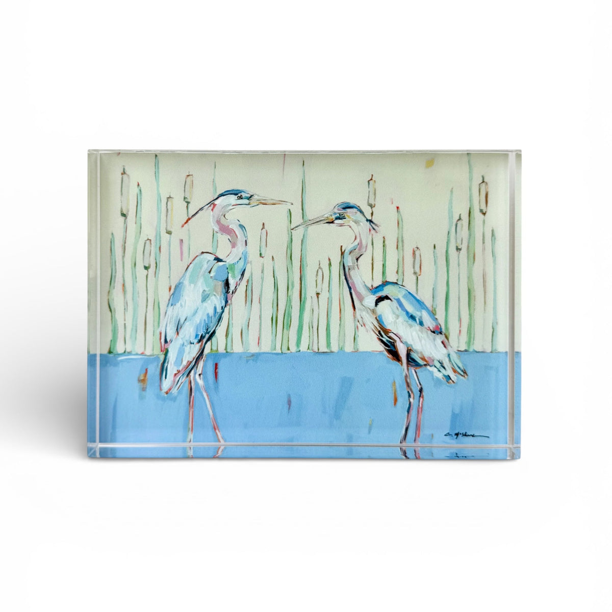 Tabletop acrylic art panel with two blue herons, reeds, and blue water scene
