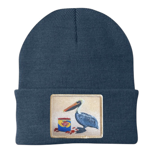Dusty blue knit beanie with embroidered pelican patch on front