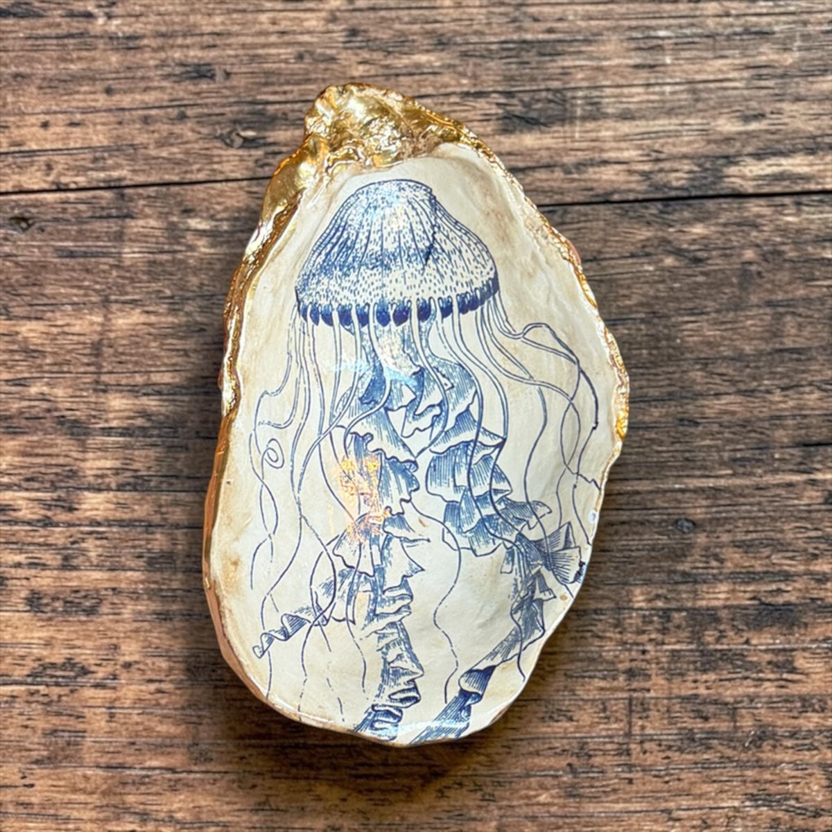 Blue-and-white jellyfish illustration shell trinket dish with gold rim