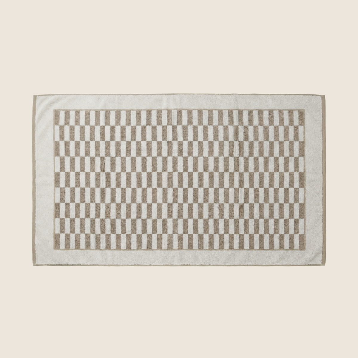 Rectangular cotton towel with cream and beige check plaid center panel