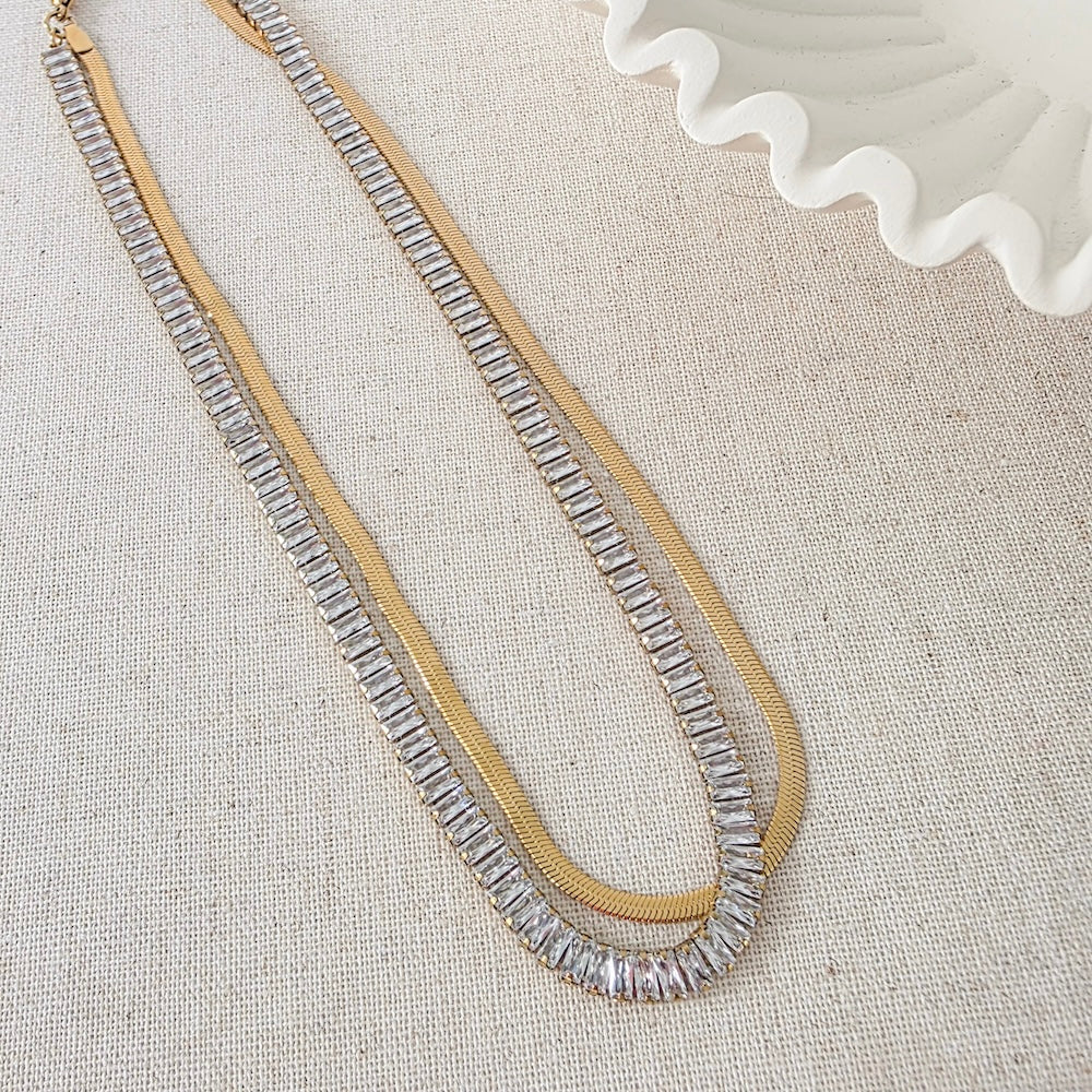 Gold double-row layered necklace with rhinestone-style sparkle