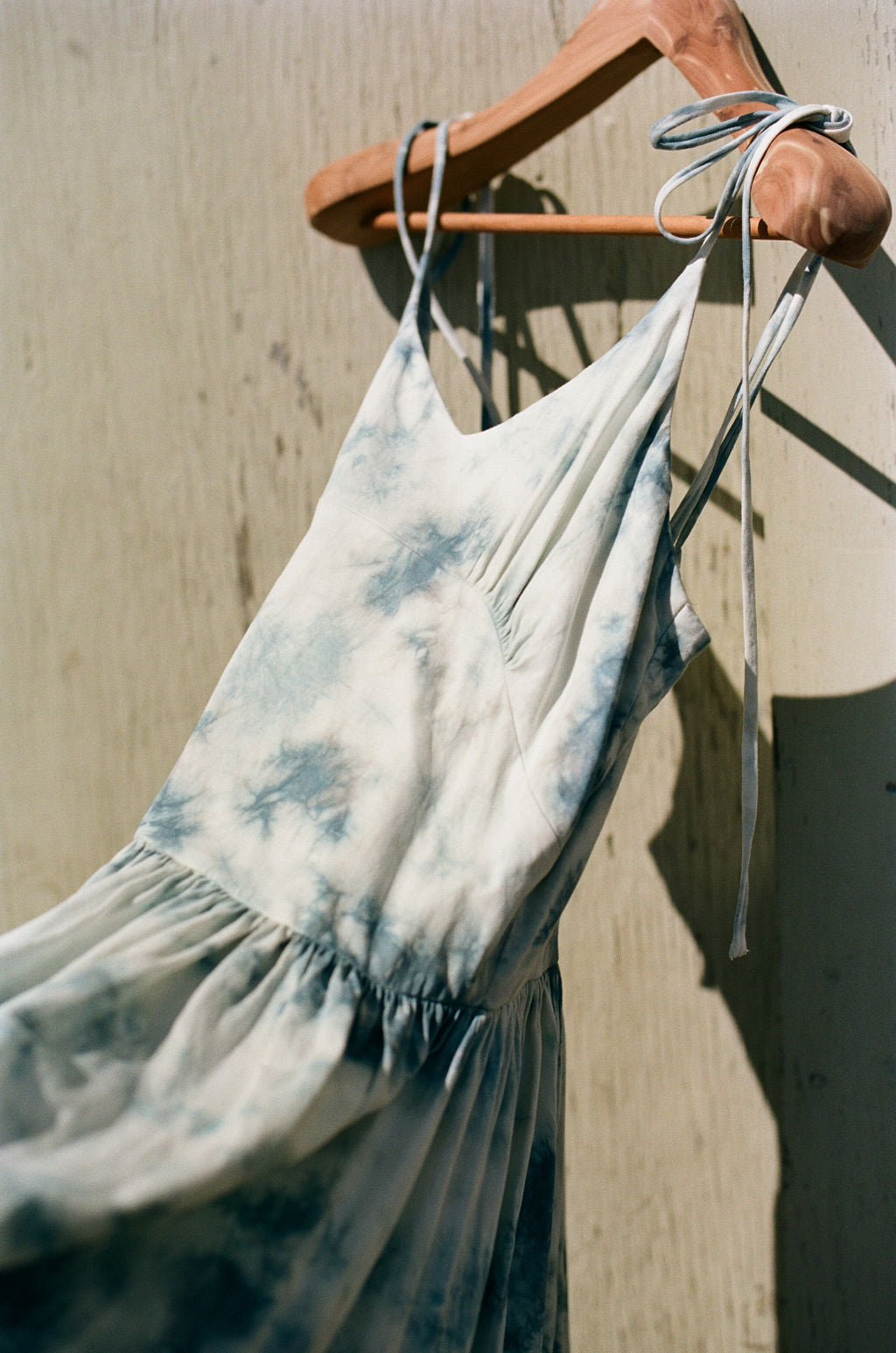 Tie-dye slip dress with spaghetti straps and gathered skirt