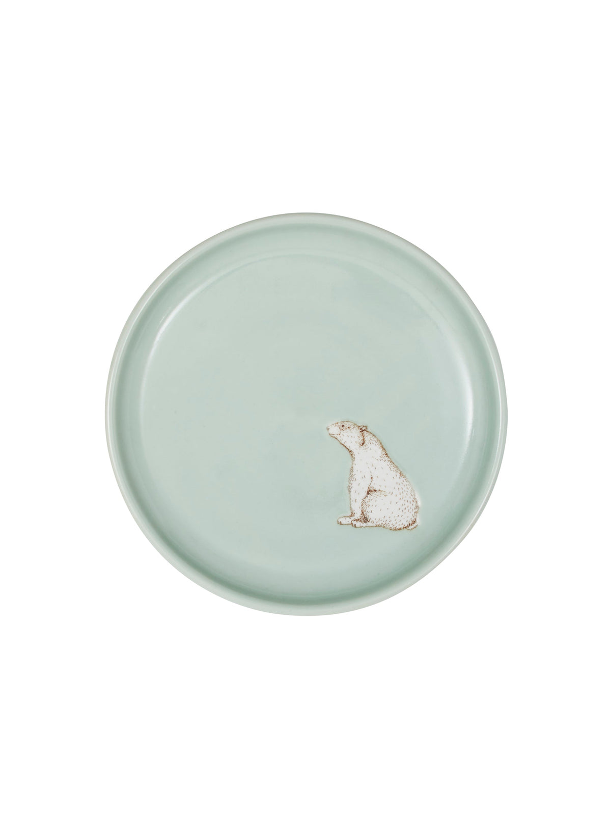 Round mint ceramic plate with small polar bear illustration at center