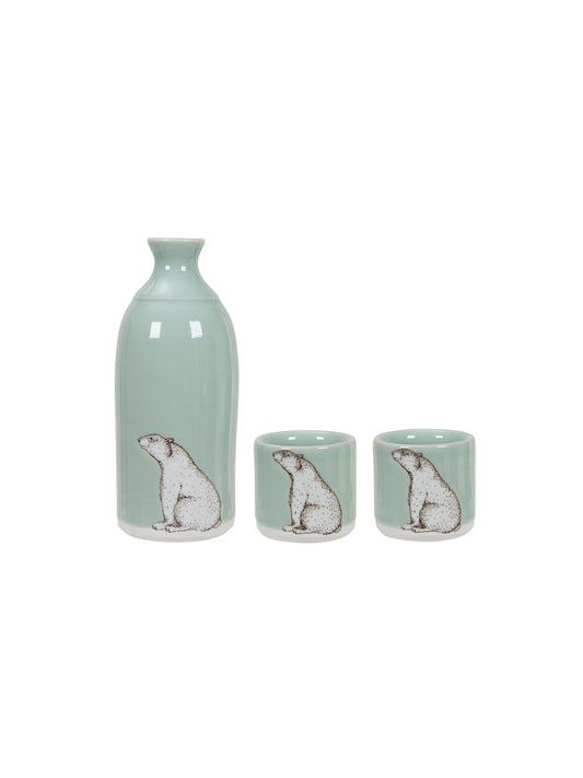 Celadon sake pitcher with polar bear design and two matching small cups