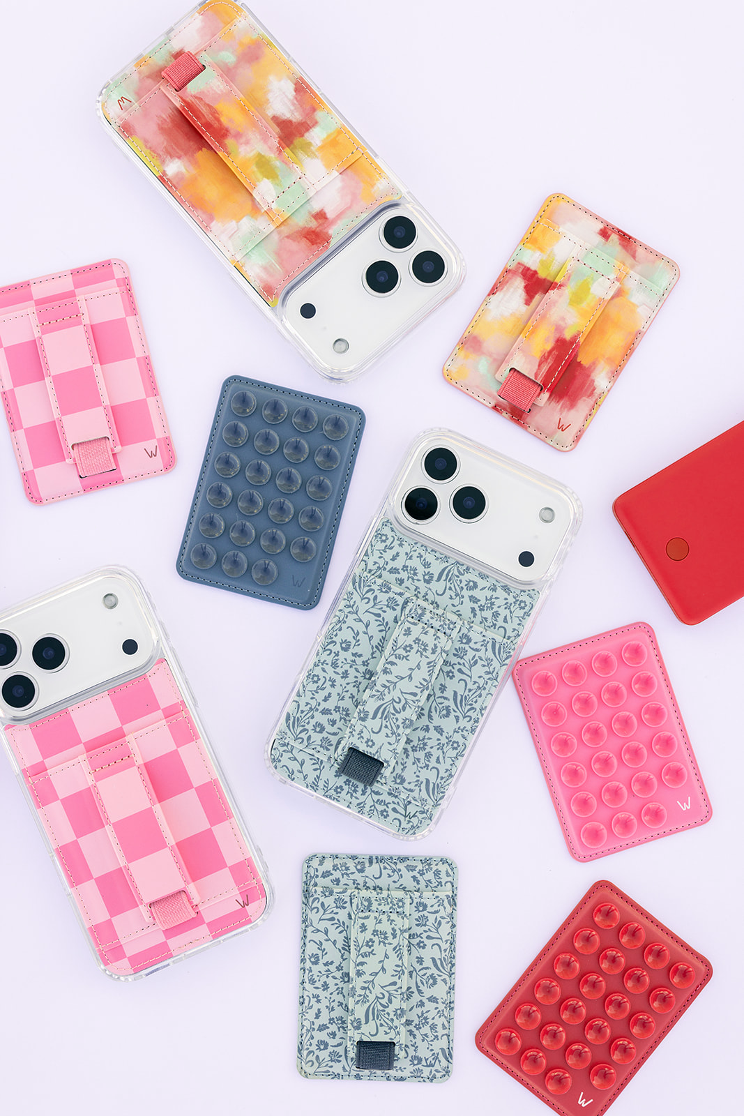 Assorted magnetic wallet phone cases with floral and check patterns in blue and pink