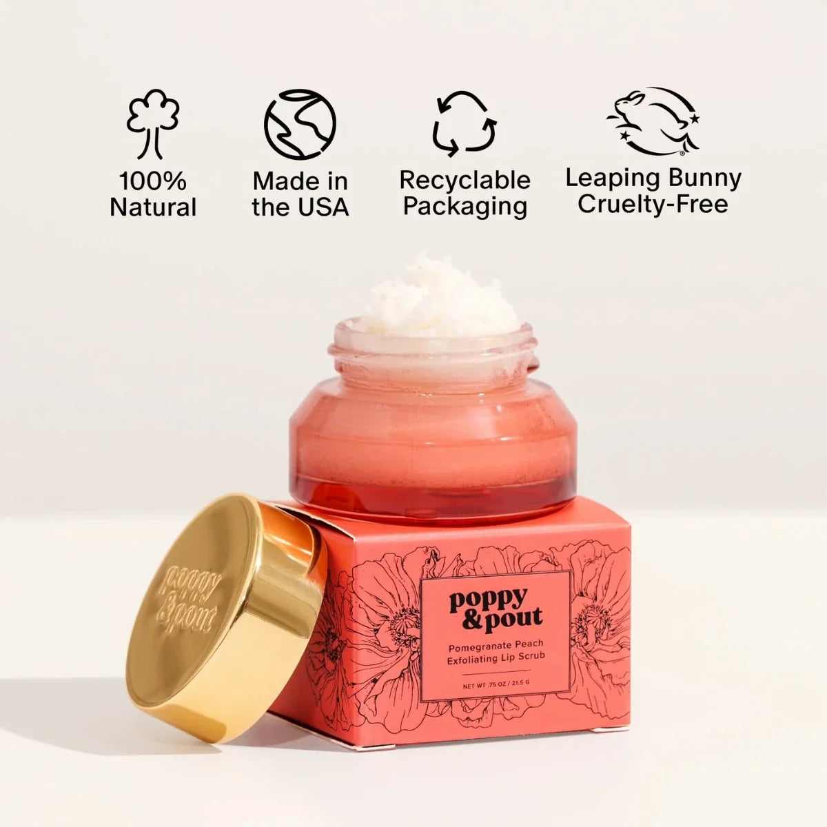 Pomegranate peach lip scrub bottle with gold cap and pink label