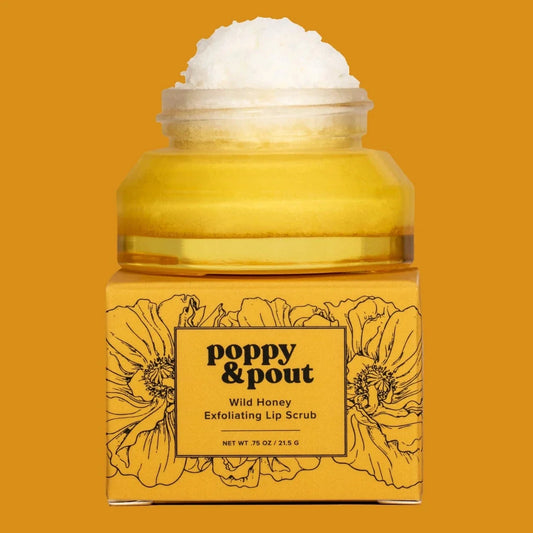 Wild honey lip scrub jar with white scrub topping and poppy & pout label
