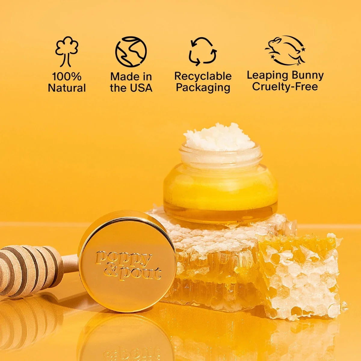 Wild honey lip scrub jar with open lid and honey-colored scrub inside