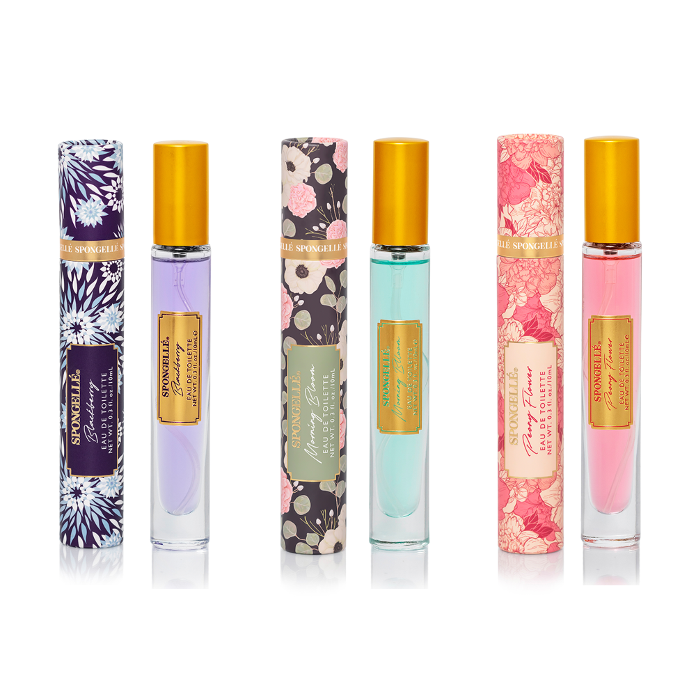 3-piece eau de toilette set with purple, teal, and pink spray bottles in gold caps