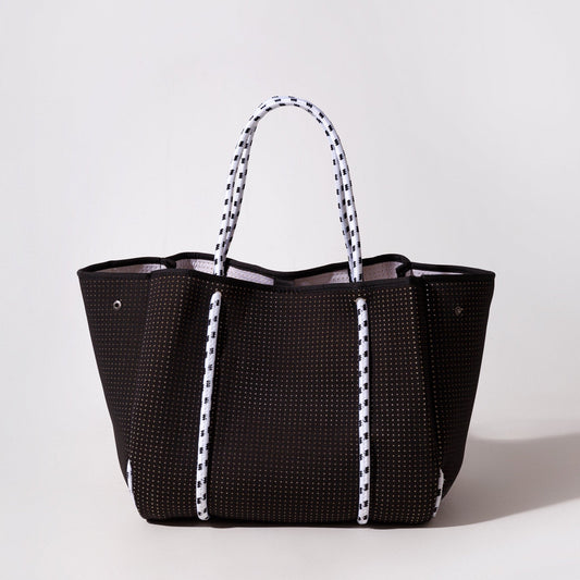 Black perforated tote bag with striped handles and open top.