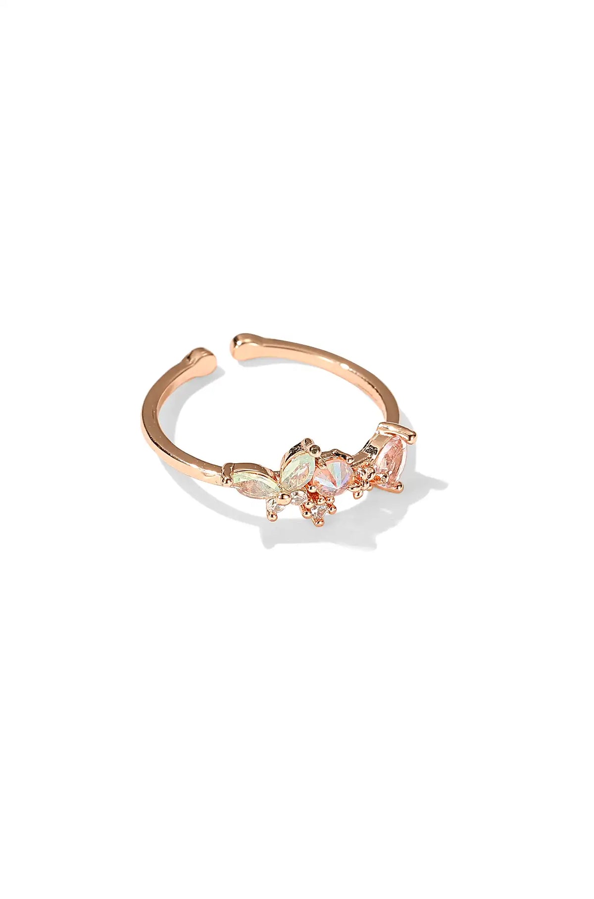 Rose gold butterfly ring with pink stones and an open adjustable band
