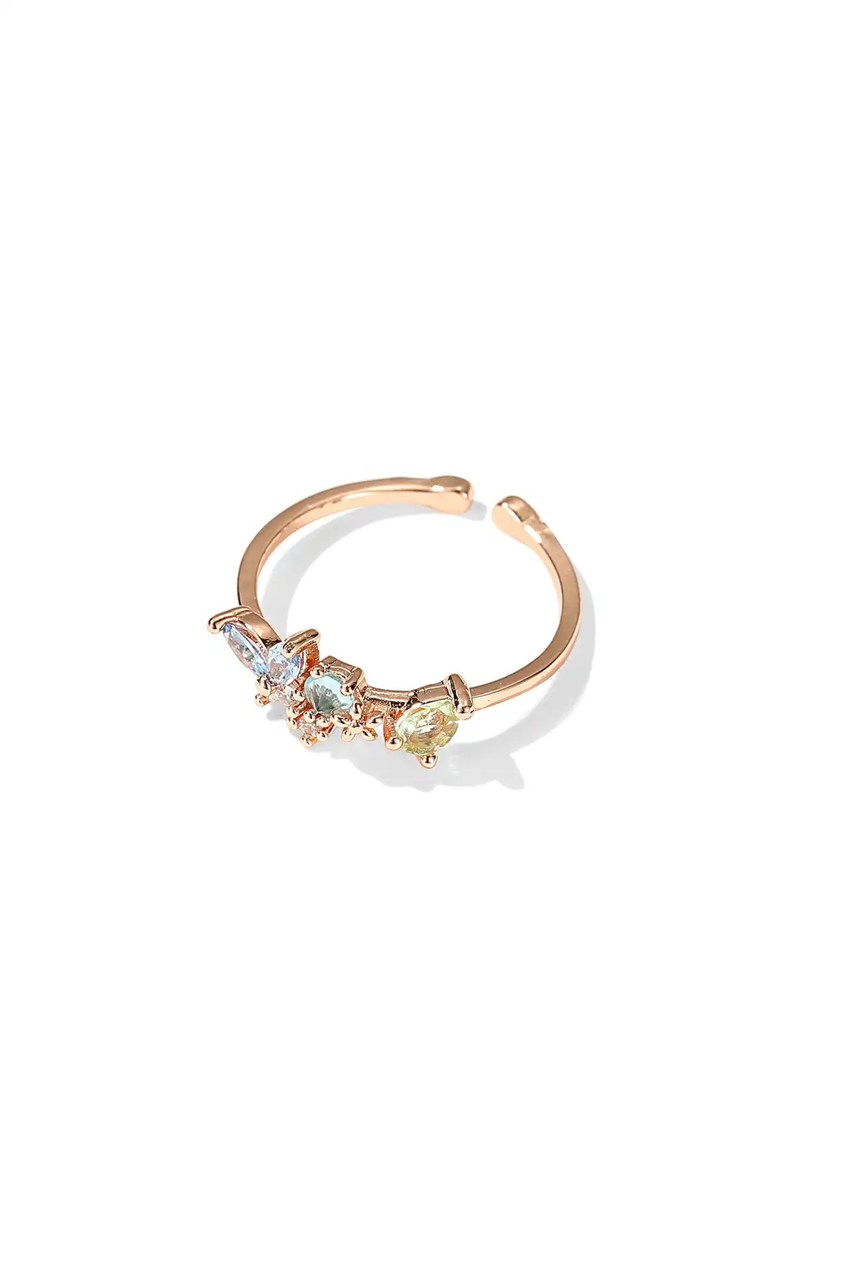 Rose gold butterfly ring with blue stones and an open adjustable band