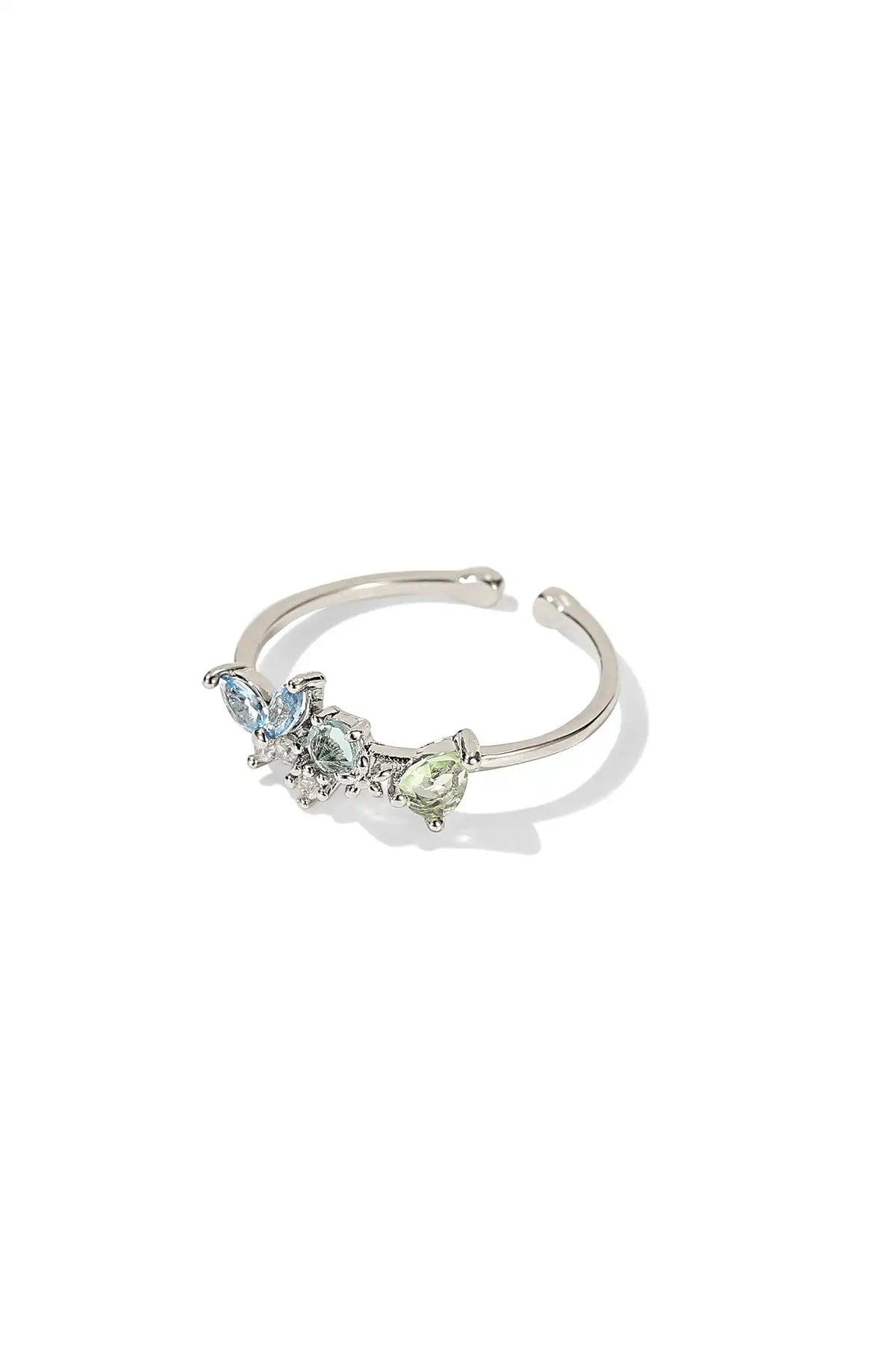 Silver butterfly ring with blue stones and an open adjustable band