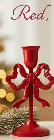 Red cast iron bow taper candle holder with fluted candle cup