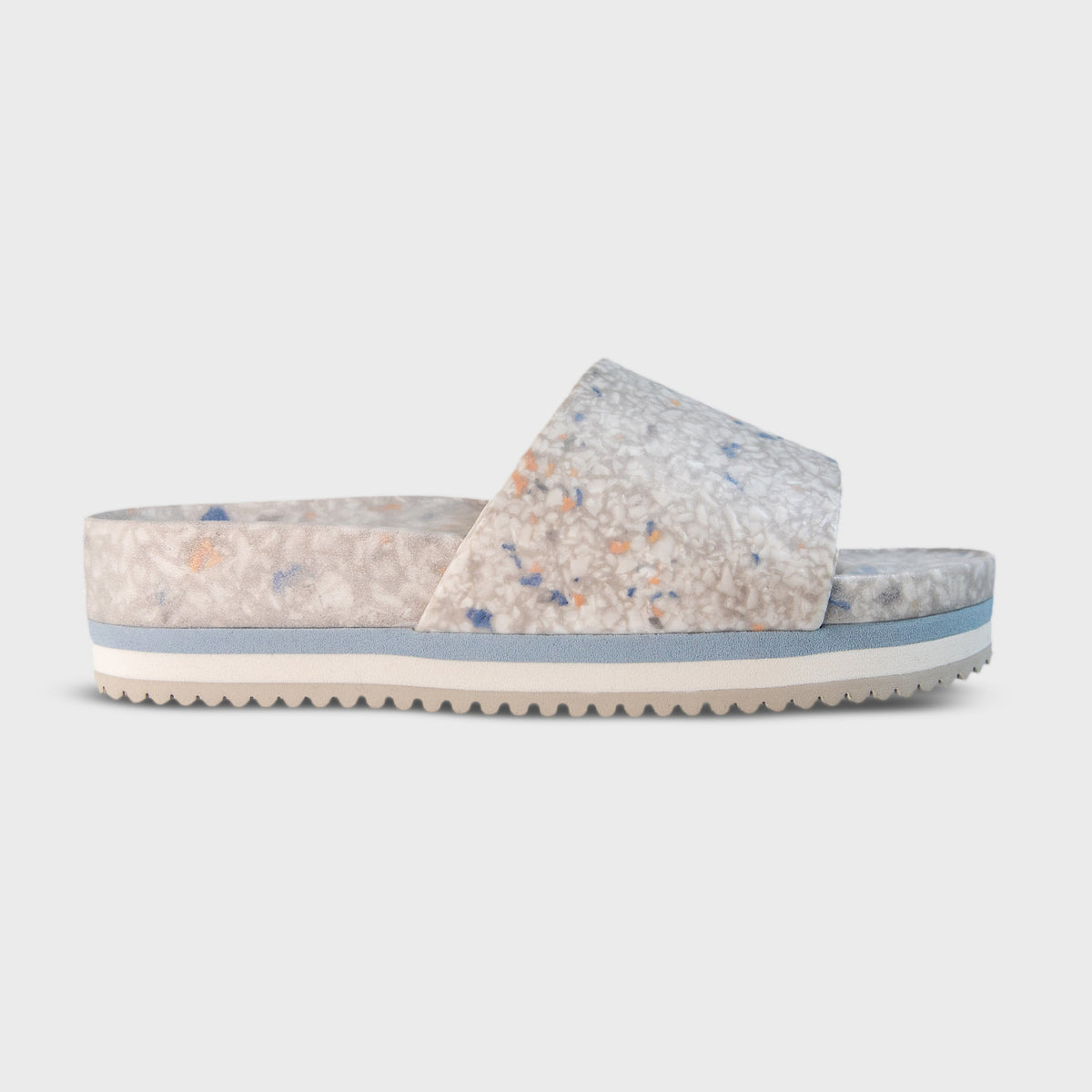 Speckled faded denim slide sandal with open toe and chunky platform outsole
