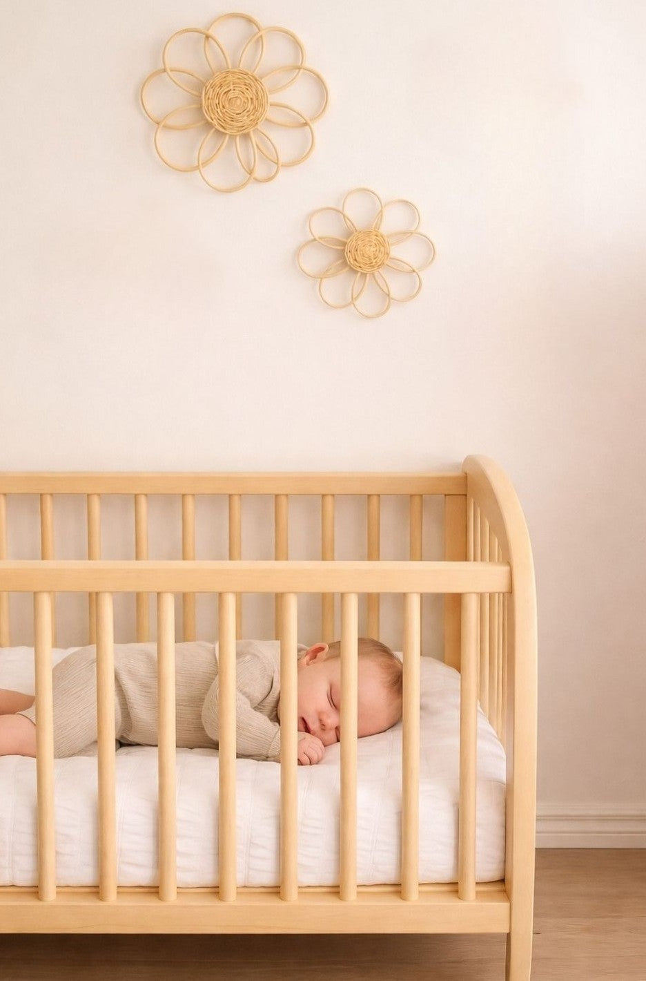 Natural rattan flower wall art set of two above a nursery crib