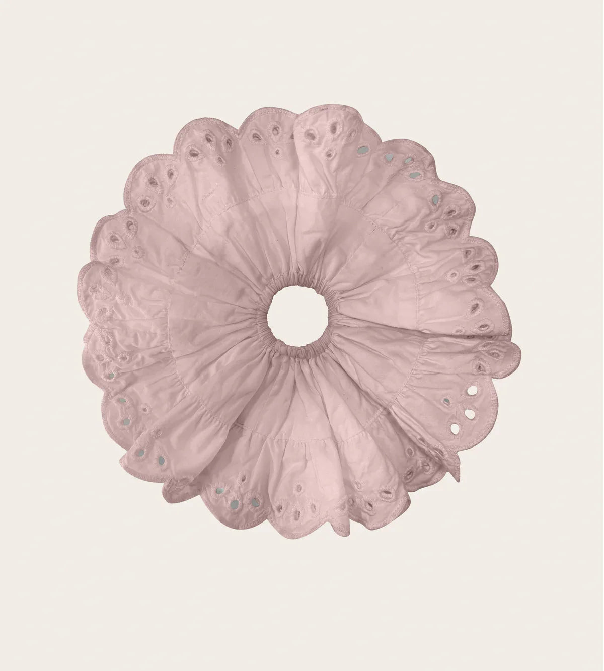 Dusty pink eyelet scrunchie with a gathered center and scalloped edges.