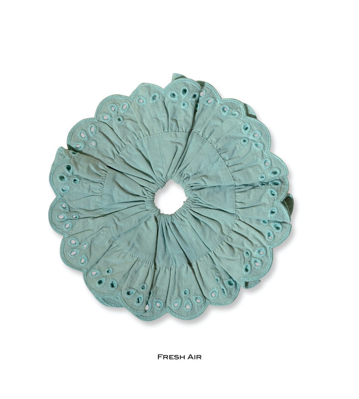 Fresh Air eyelet scrunchie in pale blue with gathered fabric and scalloped edges.