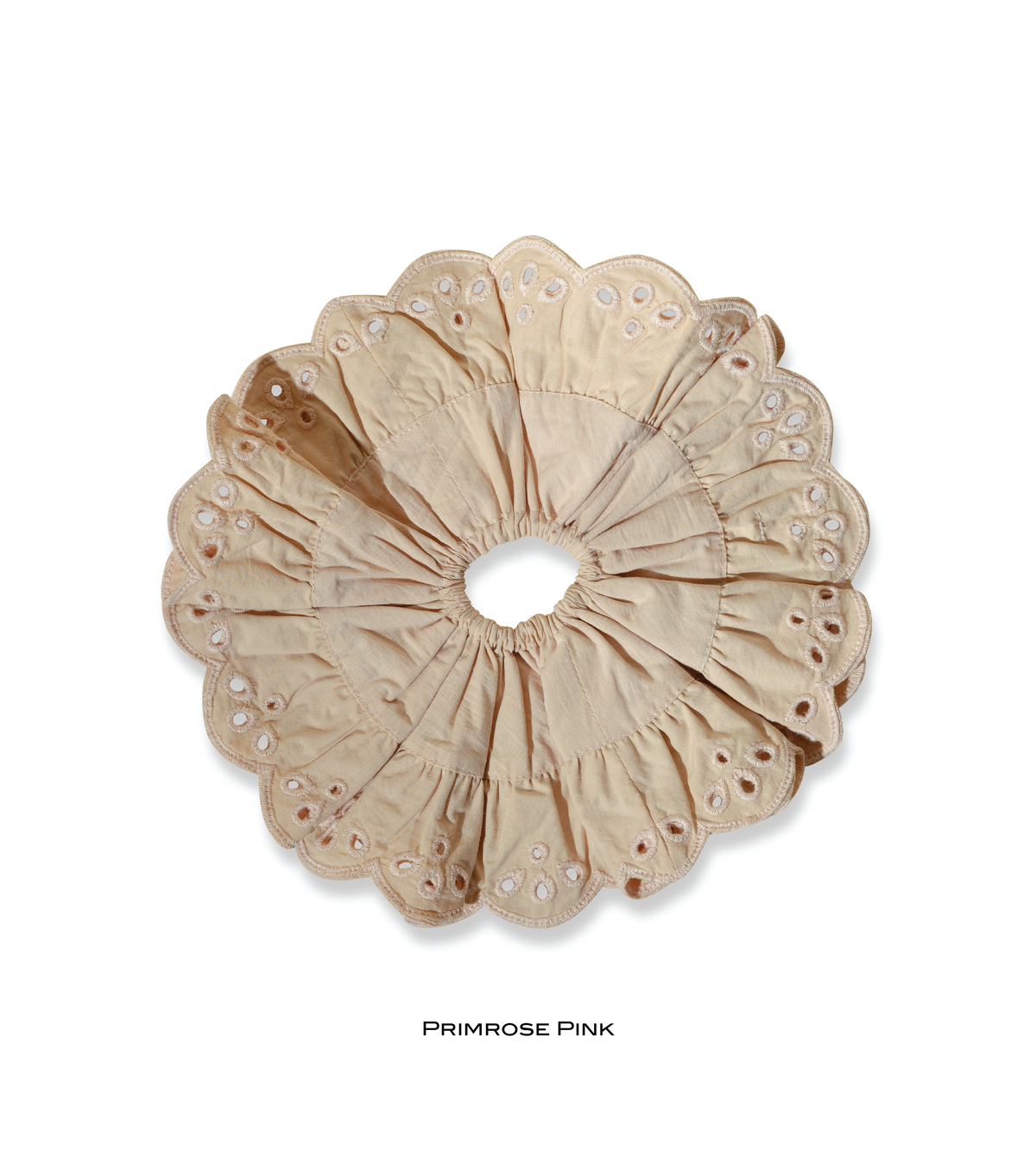Primrose Pink eyelet scrunchie in a soft peach shade with gathered fabric.