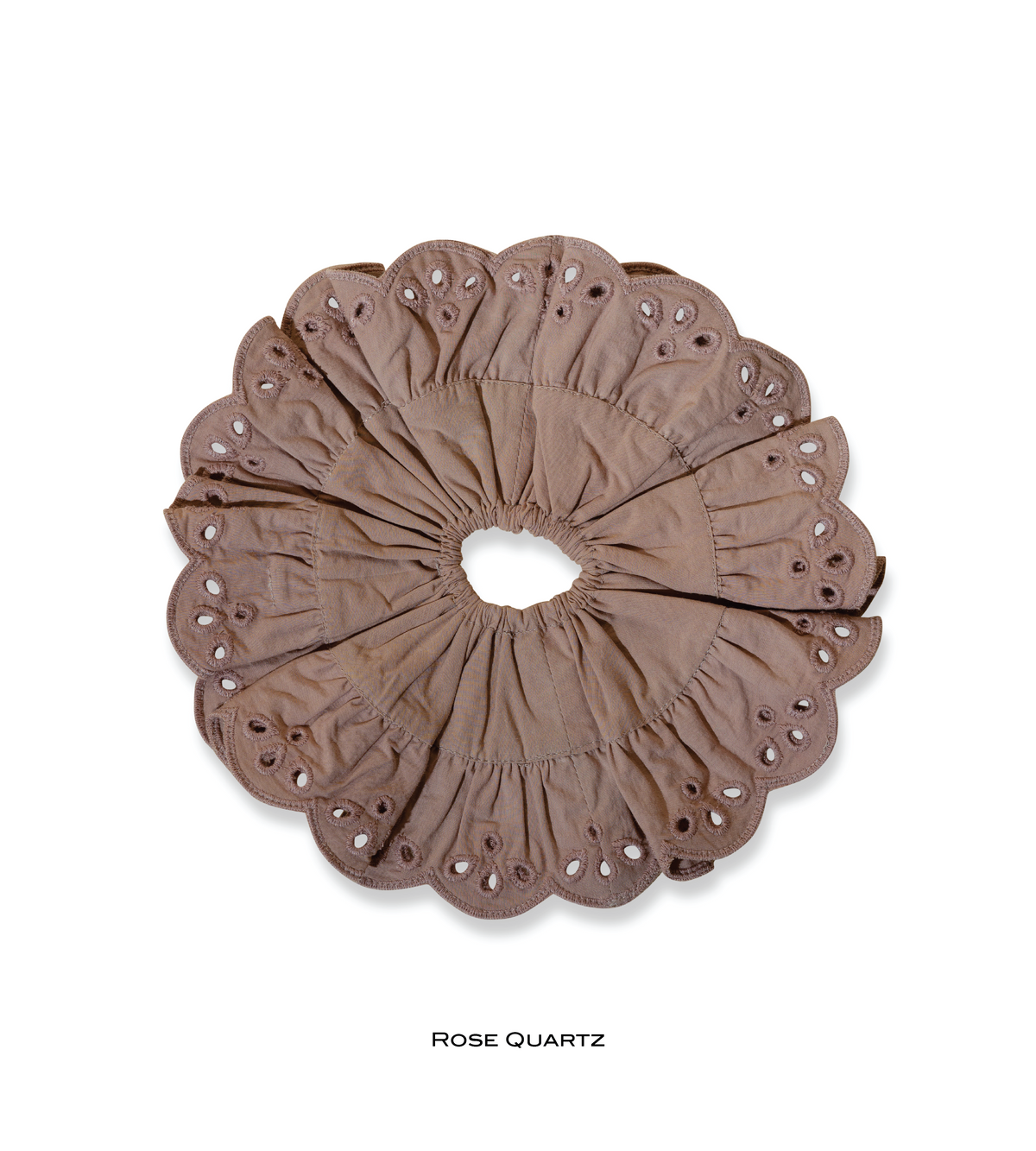 Rose Quartz eyelet scrunchie in muted mauve with scalloped edges.