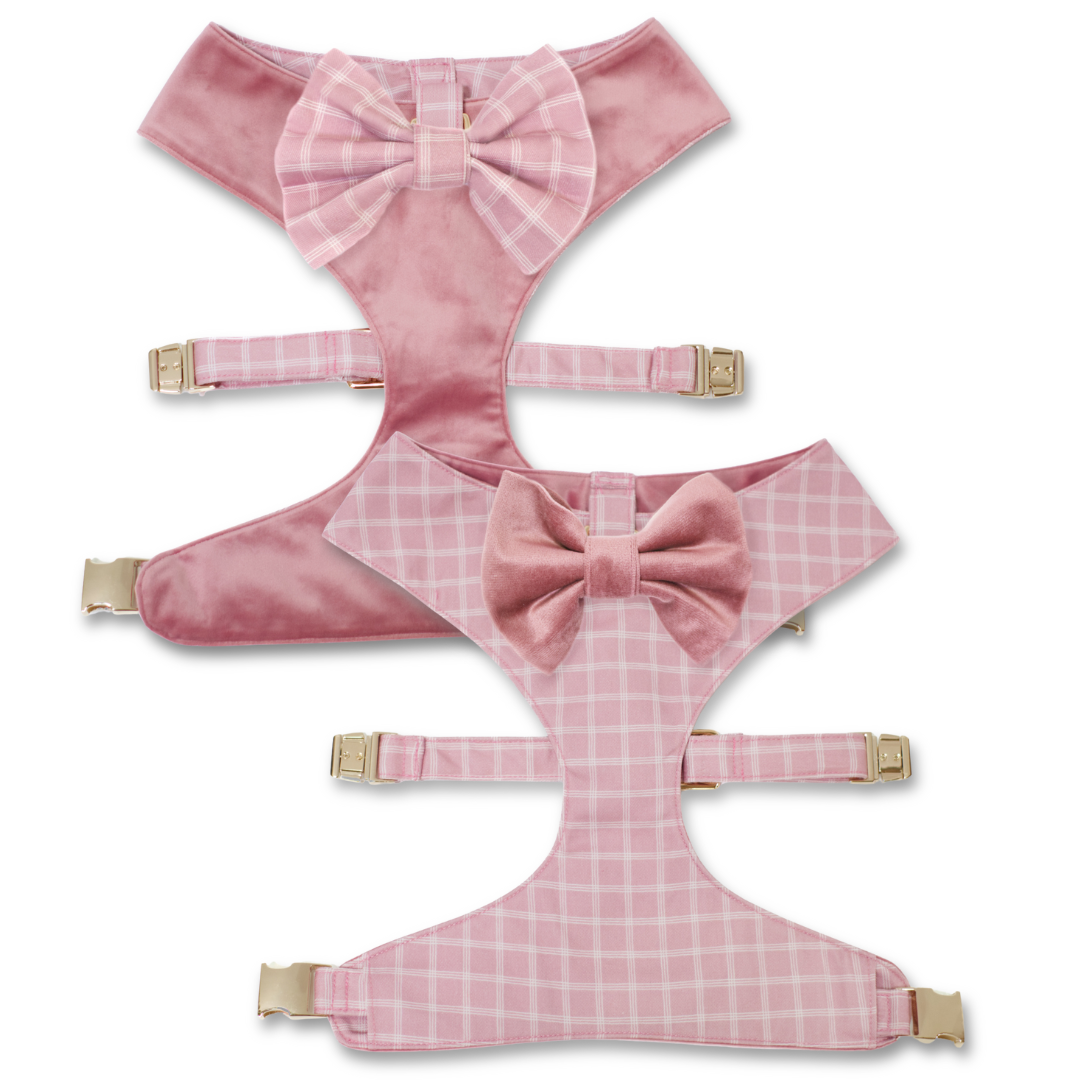 Reversible dog harness with pink velvet panels, plaid straps, and bow tie detail