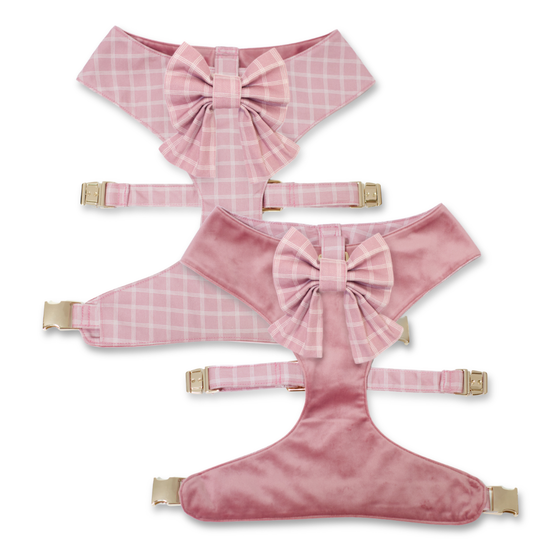 Reversible pink plush dog harness with plaid panels and tied sailor bow