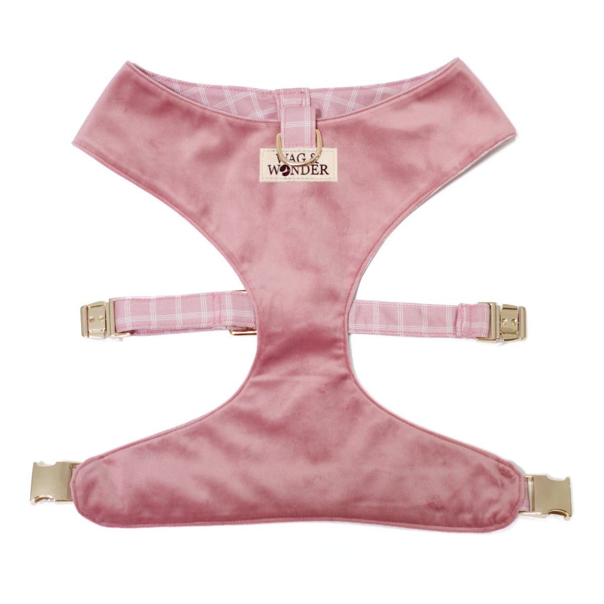 Pink reversible dog harness with solid satin-like panel and gold buckle straps
