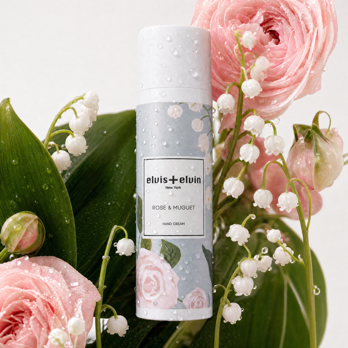 elvis+elvin hand cream bottle with pink rose and white muguet flowers