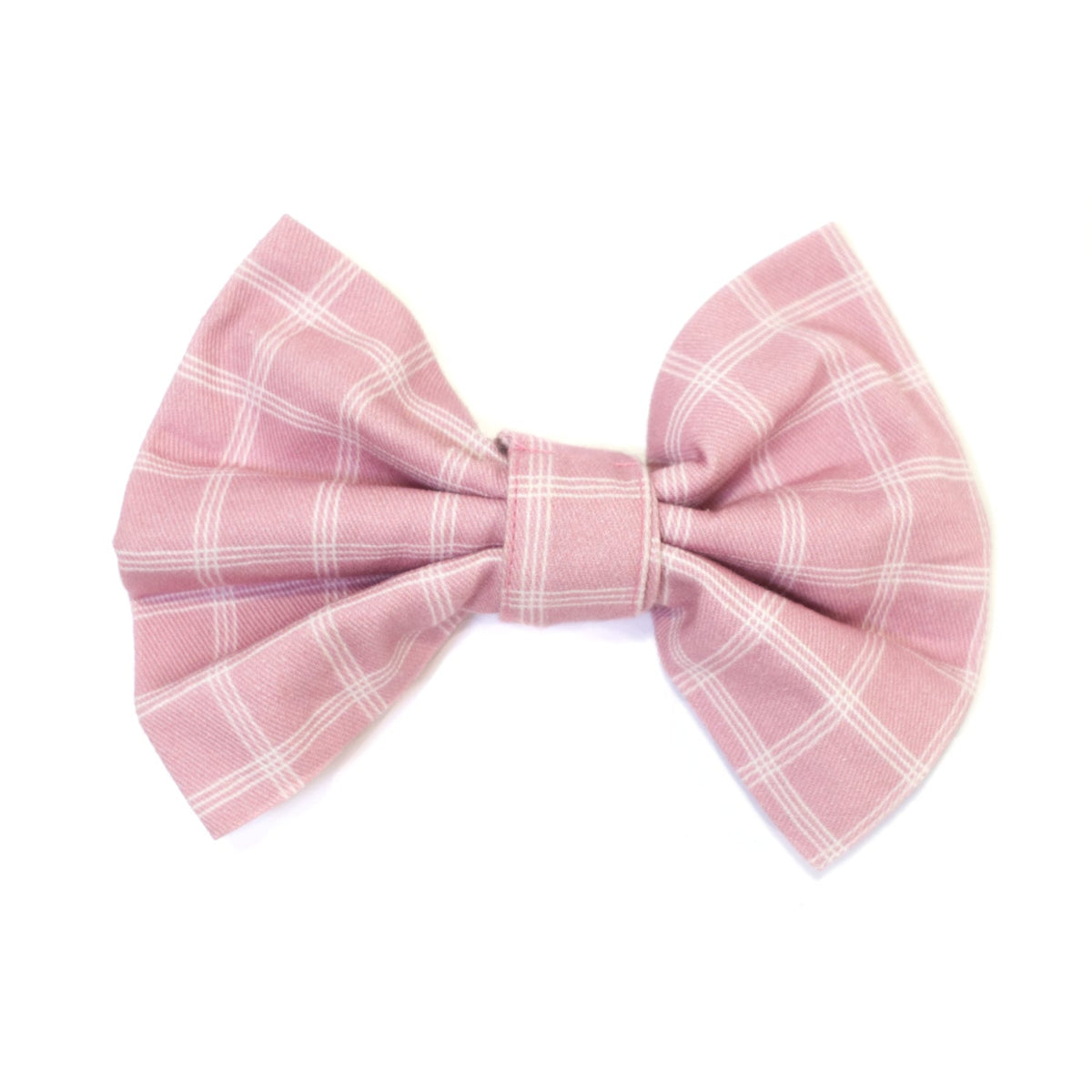 Pink plaid bow tie with center knot on a fabric bow