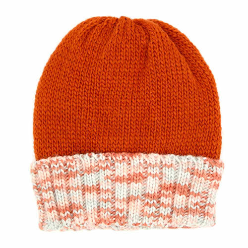Orange knit fleece beanie with light pink speckled folded cuff