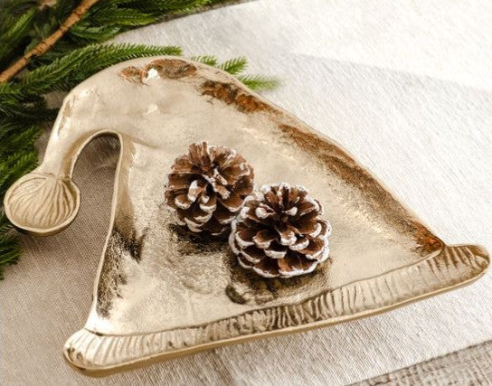 Gold Christmas cap-shaped tray with a textured rim and two pinecones