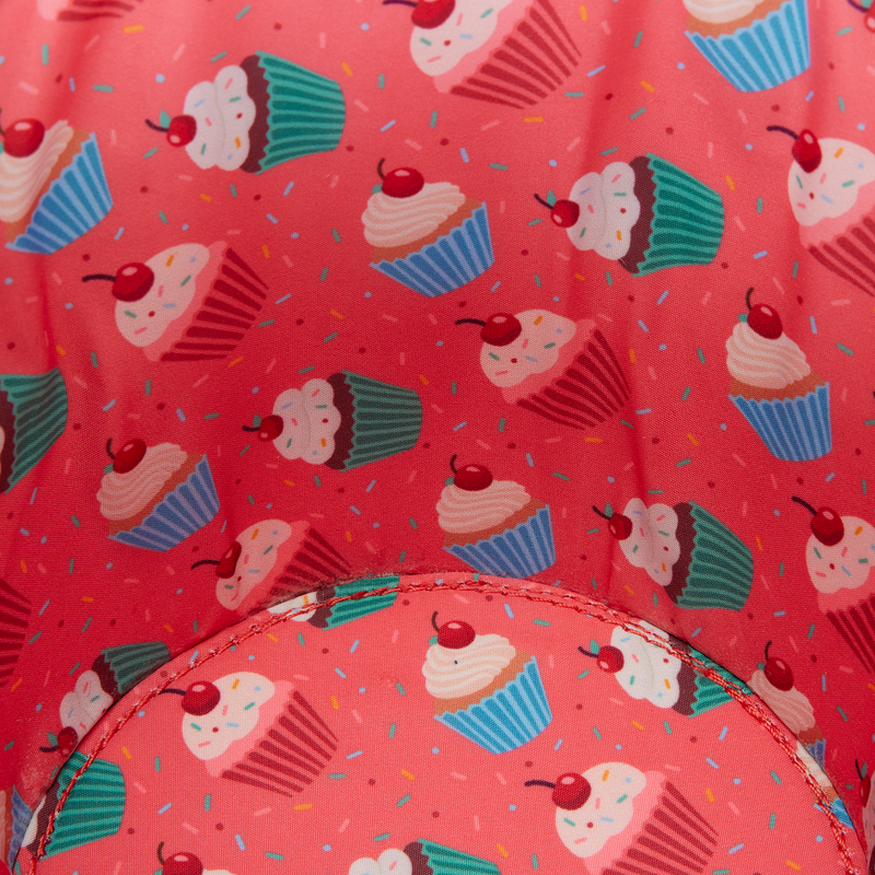 Loungefly bag interior lined with a colorful cupcake and sprinkle print