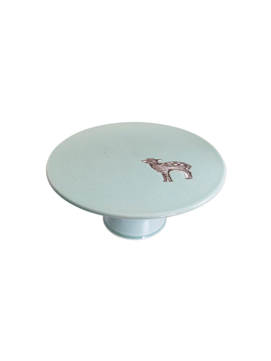Celadon ceramic cake stand with small animal motif on round top