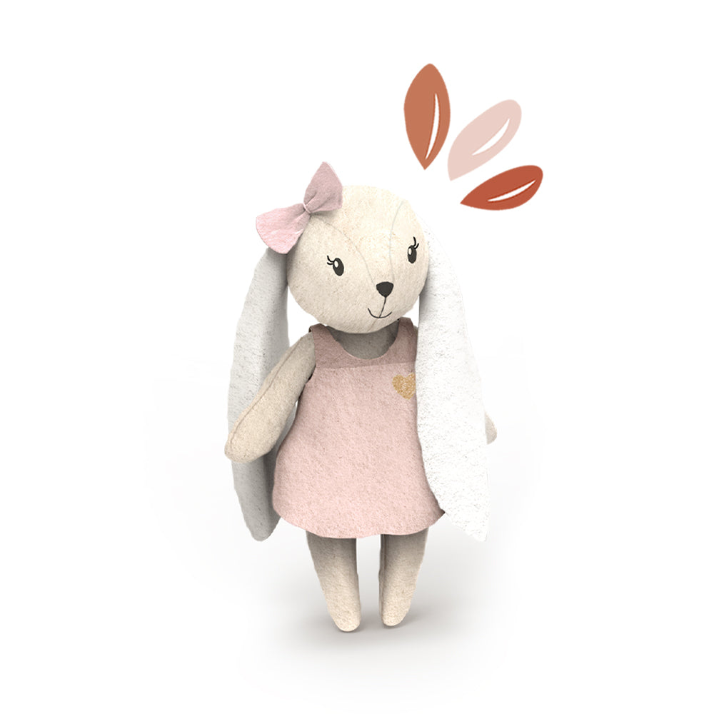Rabbit plush doll in pale pink dress with small bunny-ear details