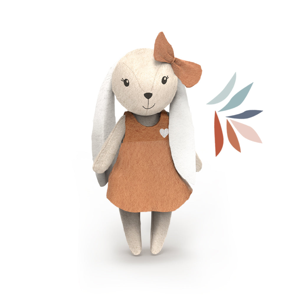Rabbit plush doll with tan dress and white long ears