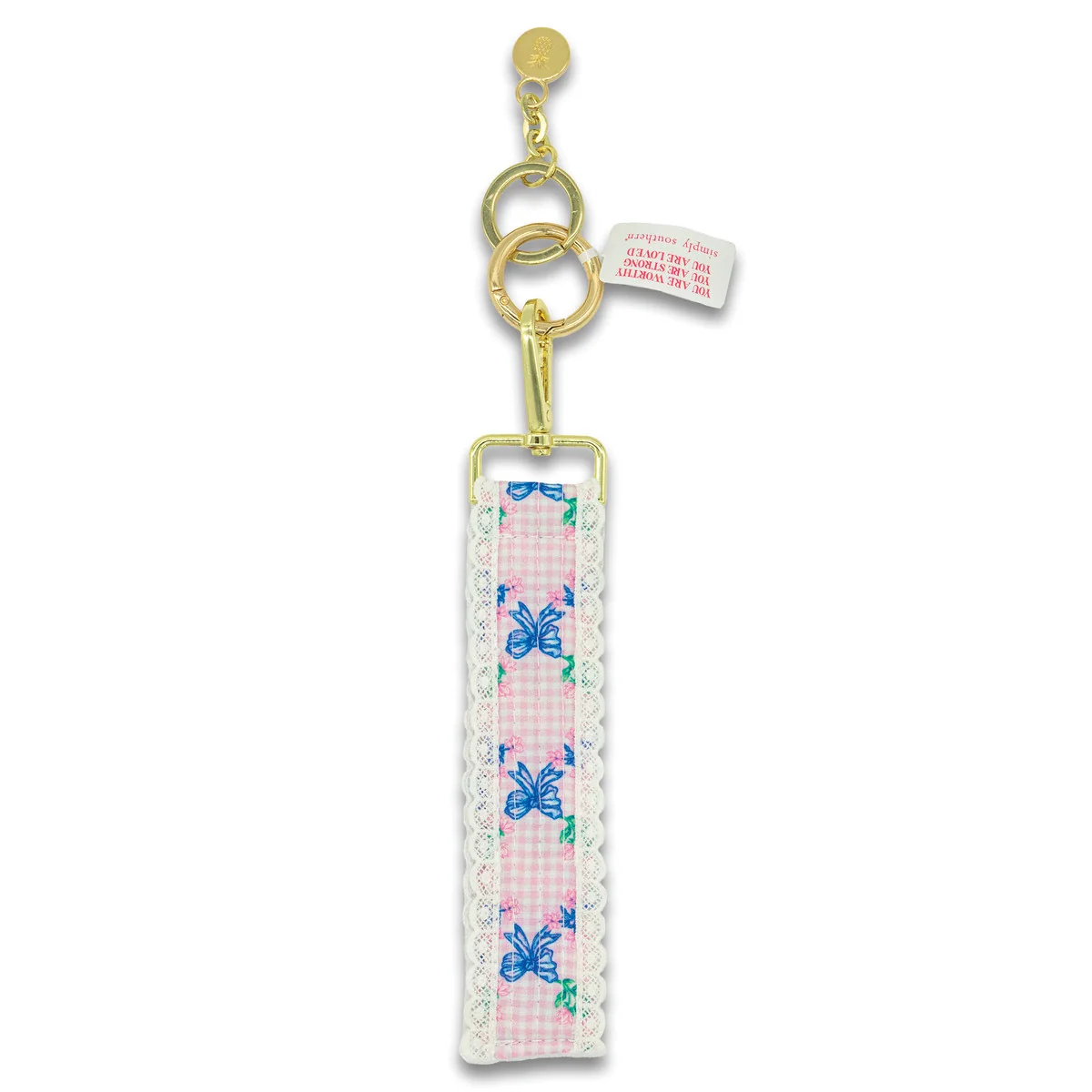 Blue lace bow keyfob with gold clasp, ribbon bow print, and hanging tag.