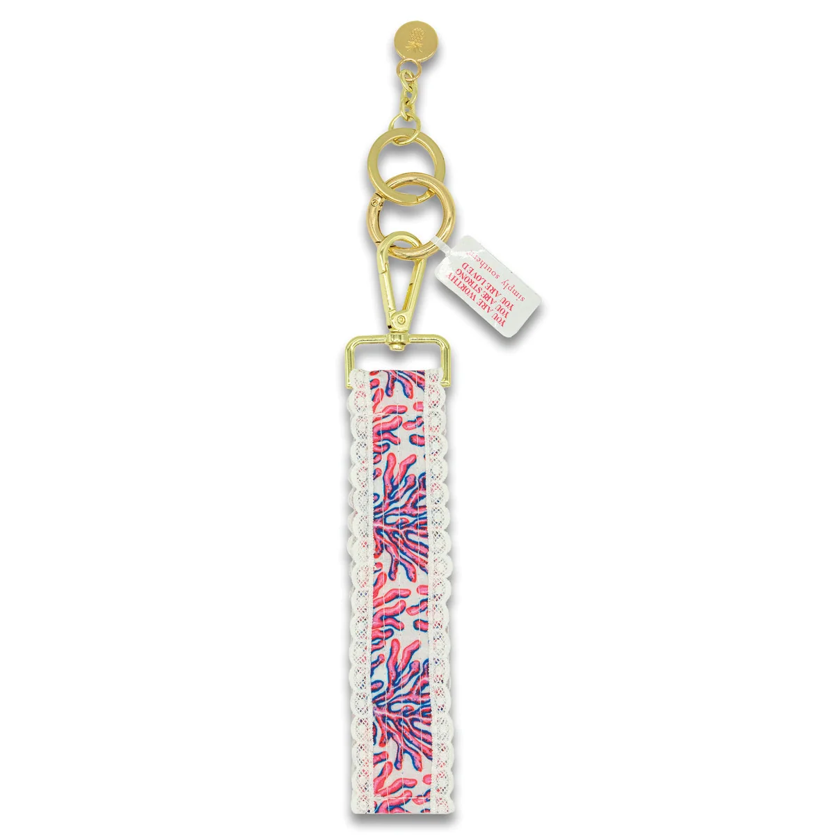 Coral lace keyfob with gold keyring and patterned lace strap