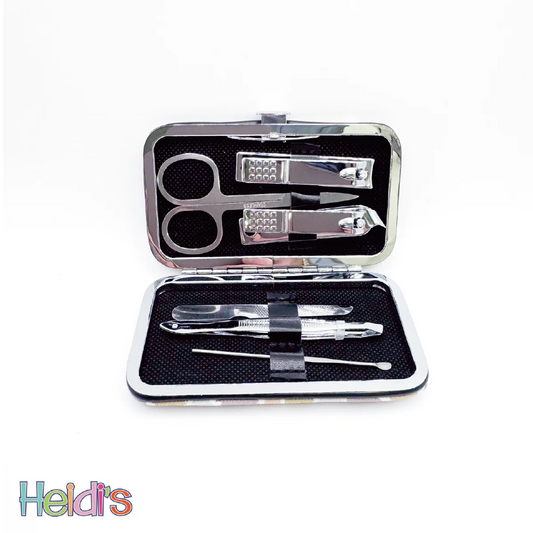 Open manicure travel kit with metal tools: clippers, file, and tweezers.