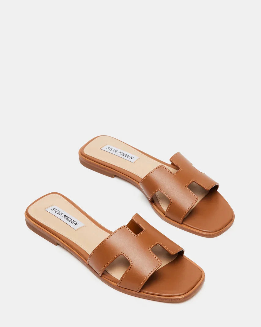 Cognac leather slide sandals with two strap panels and stitched cutouts
